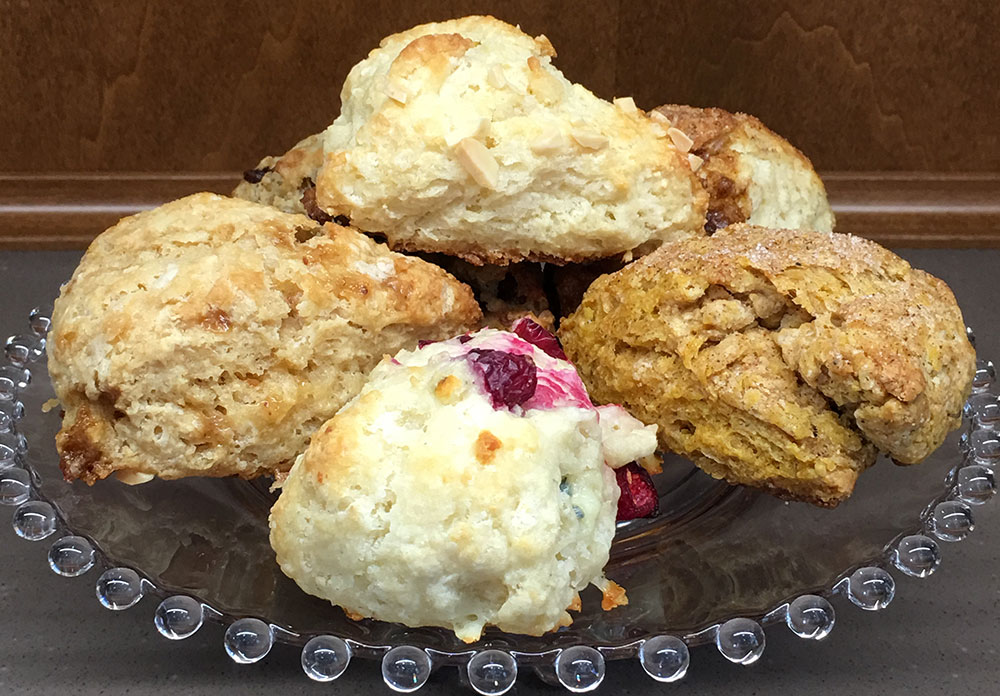Variety of scones on glass plate