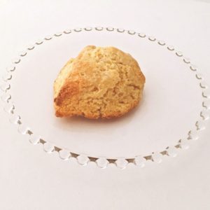 Cornmeal Scone made from Cornmeal Scone Mix sitting on glass plate