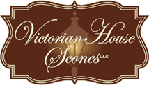 Company Logo for Victorian House Scones; dark brown background, lit lamp in center with name written in script.